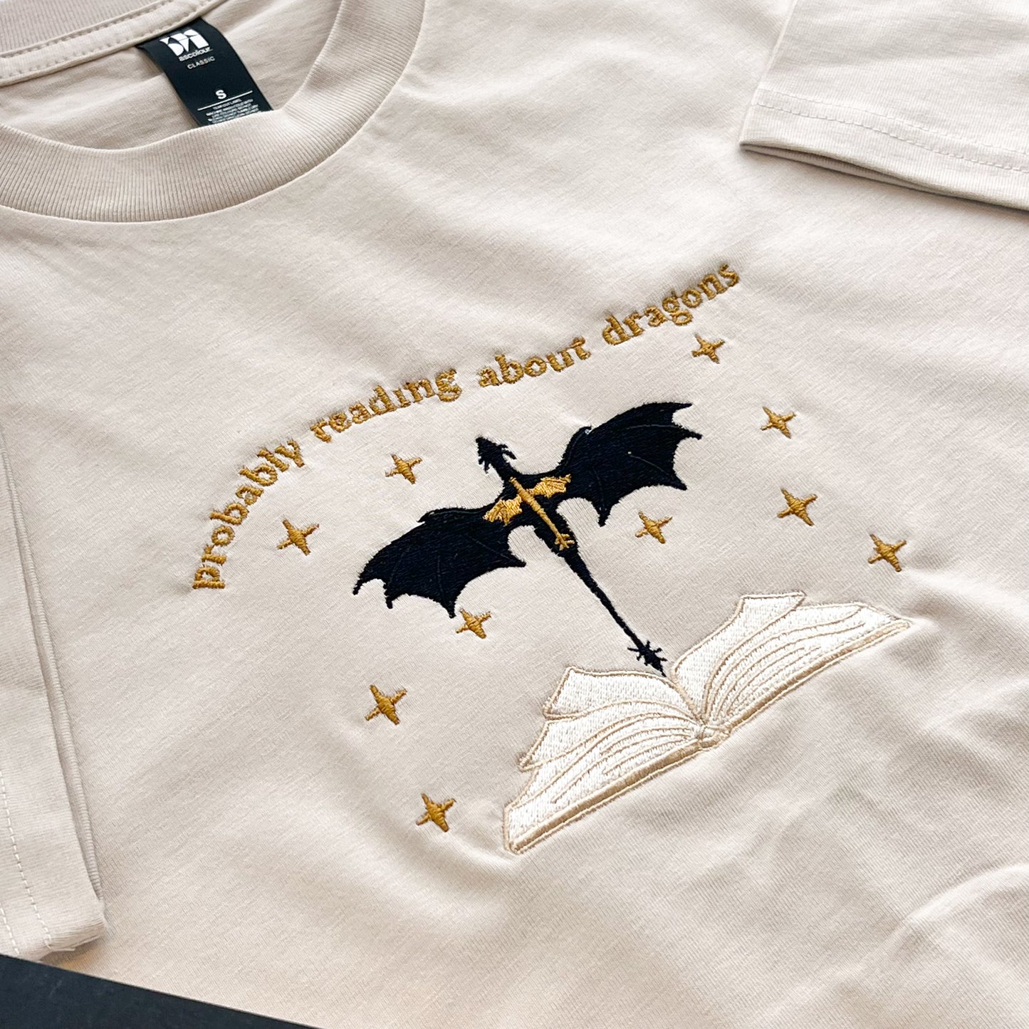Probably Reading About Dragons Embroidered Tee