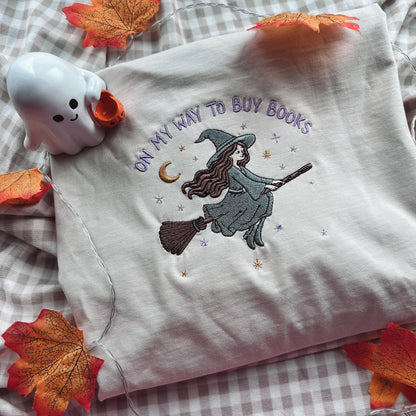 On My Way To Buy Books Embroidered Crew