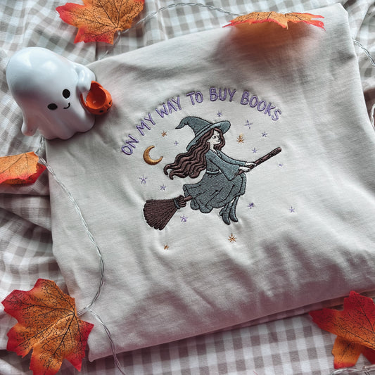 On My Way To Buy Books Embroidered Tee